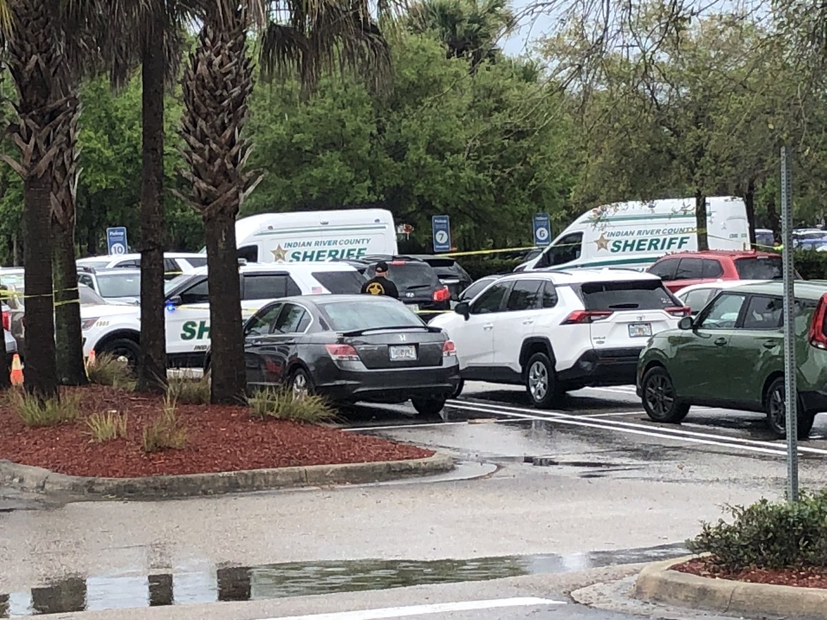 Two @IRCSheriff crime scene vans and several patrol vehicles can be seen in the Sam's Club parking lot, where a disturbance led to a deputy-involved shooting Thursday. The suspect was taken to a trauma center in Lawnwood