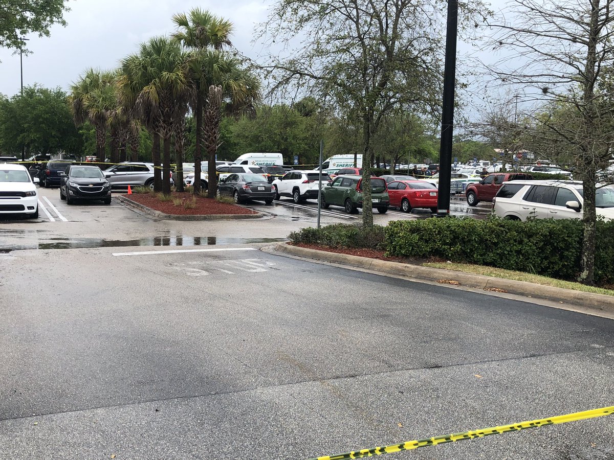 Two @IRCSheriff crime scene vans and several patrol vehicles can be seen in the Sam's Club parking lot, where a disturbance led to a deputy-involved shooting Thursday. The suspect was taken to a trauma center in Lawnwood