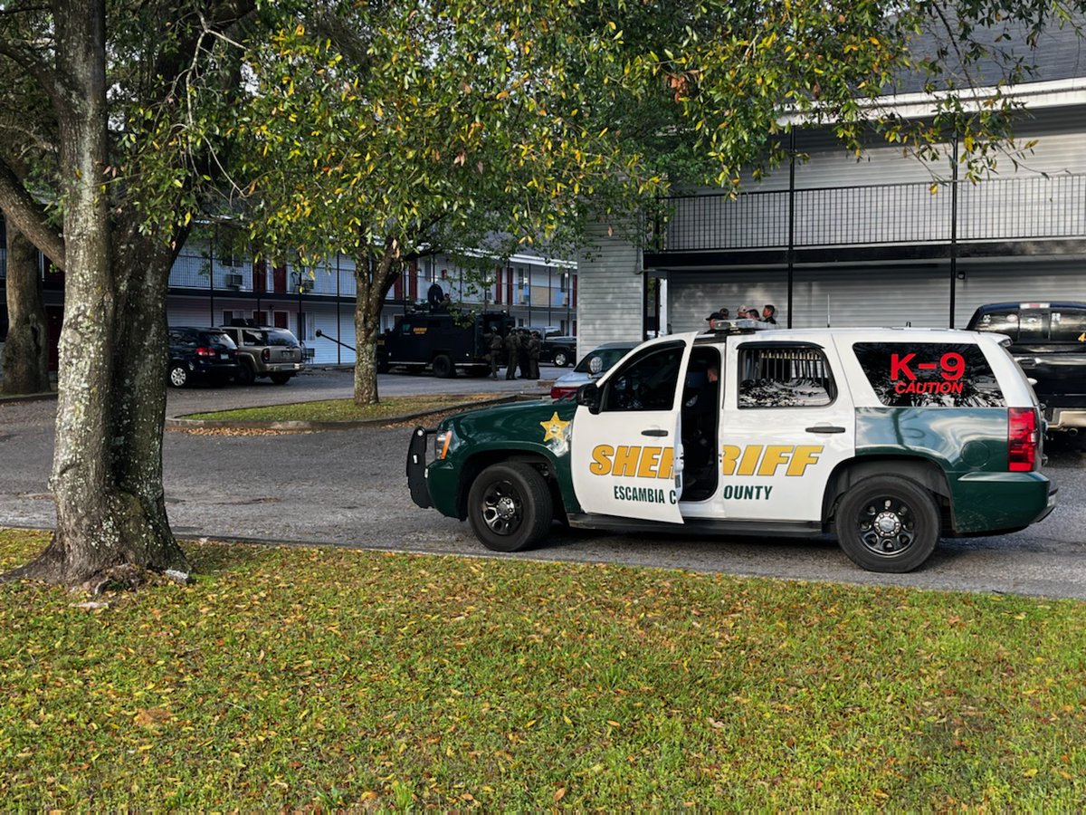 Escambia County Sheriff's Office SWAT team is in a standoff at the HomeStay Lodge motel on Mobile Hwy. as they seek a suspect with active felony warrants 