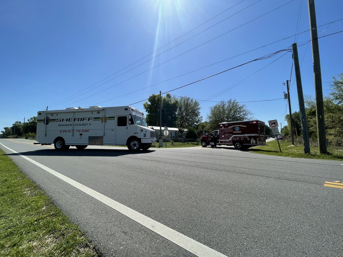 Scene where MCSO SWAT and Crisis Negotiation teams are communicating with a man who has barricaded himself the inside of a home. He threatened MCFR employee ma who came to put out a fire.