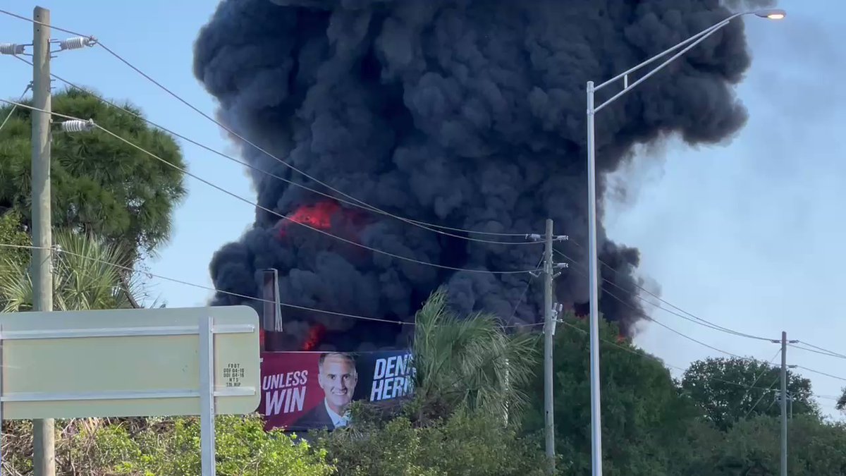 Massive Industrial fire at Port Manatee off US 41. Flames over 100 feet with explosions