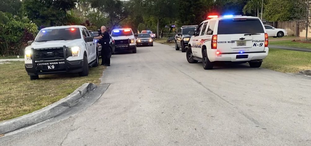 There was a manhunt tonight in North Miami. A suspected armed robber ran into this neighborhood after a clerk from a nearby store flagged down policemen. The clerk said the person came to the store two straight days