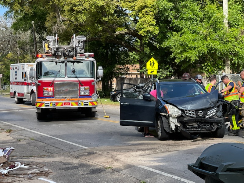 At least one person hospitalized after a two-car crash on Massachusetts Ave. in Pensacola. Lanes are blocked as EMS and FHP work the scene