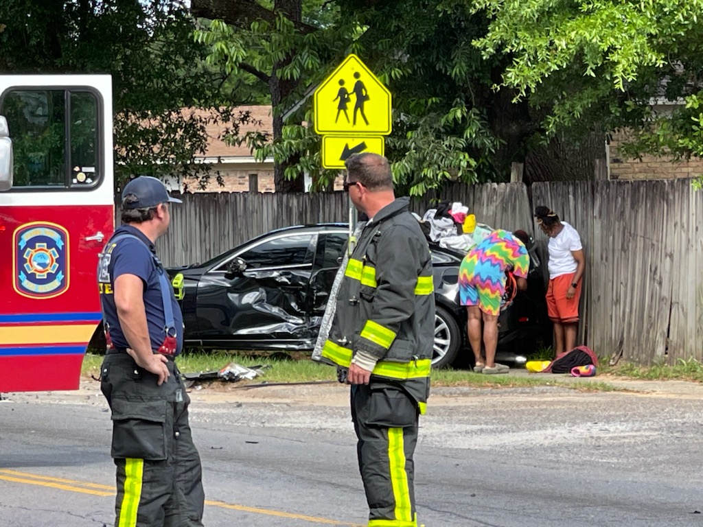 At least one person hospitalized after a two-car crash on Massachusetts Ave. in Pensacola. Lanes are blocked as EMS and FHP work the scene 