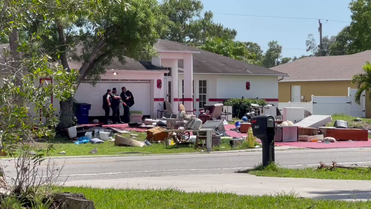 The Lee County Sheriff's Office has surrounded a home where they say there's a person barricaded inside.  deputies with guns drawn and shields outside of this home on San Carlos Blvd. in San Carlos Park