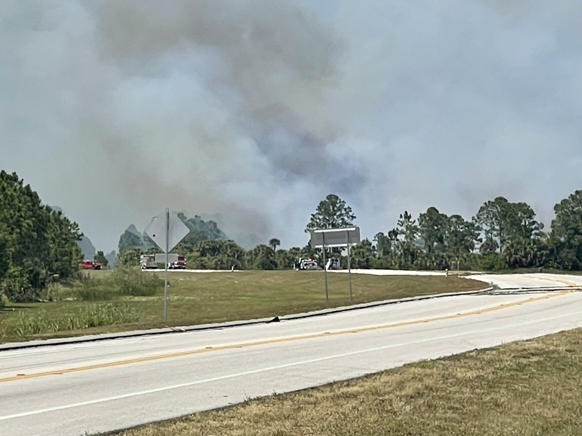 area of St John's Heritage Pkway between Pace and Emerson shutdown due to 1/2 acre wildfire. Named 'Heritage Fire' 