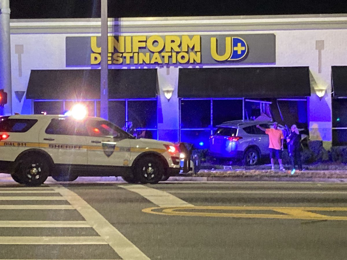 Car crashes into a SUV and then a building on Beach Blvd at University - 1 woman taken to the hospital and at least 1 person in custody