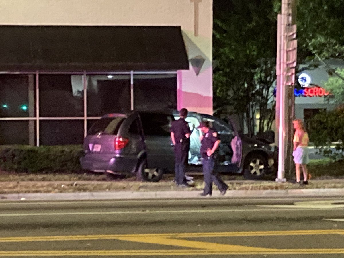 Car crashes into a SUV and then a building on Beach Blvd at University - 1 woman taken to the hospital and at least 1 person in custody 