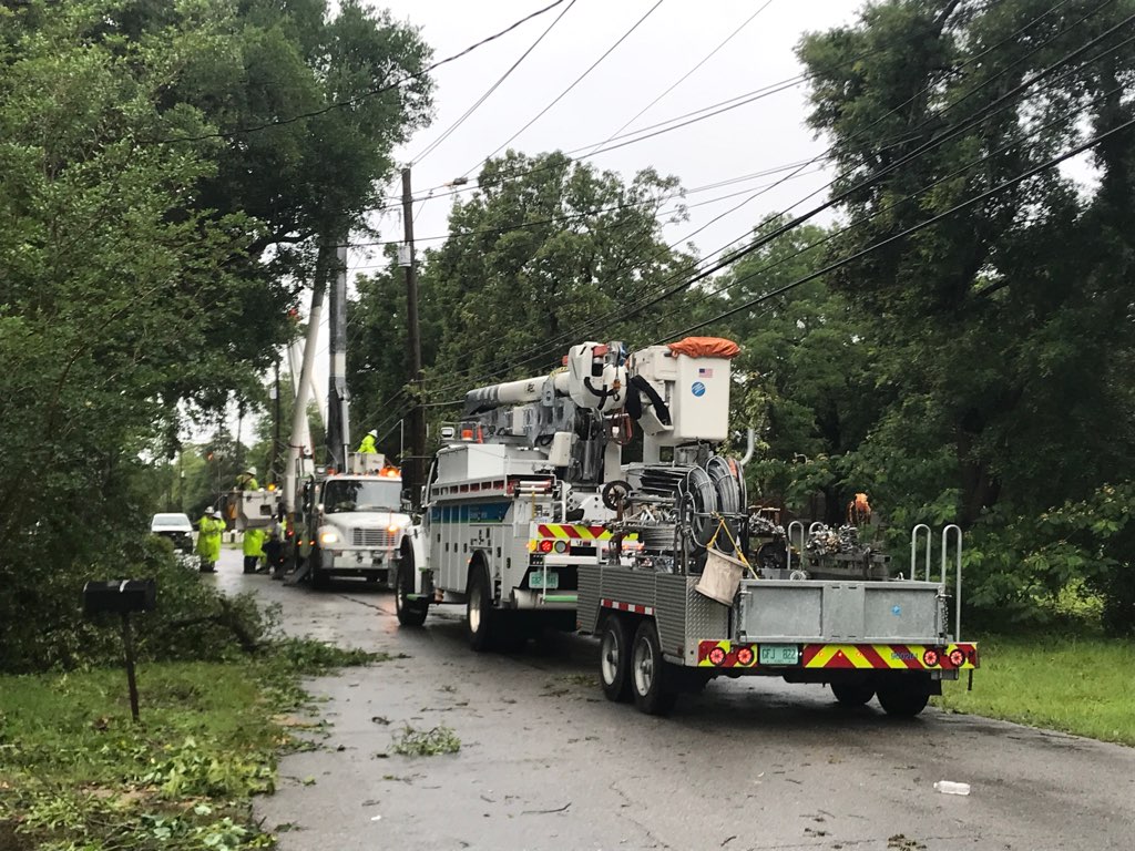 Images from Burning Tree Rd. near Scenic Hills Country Club show downed trees and power lines, as well as flipped trailers 