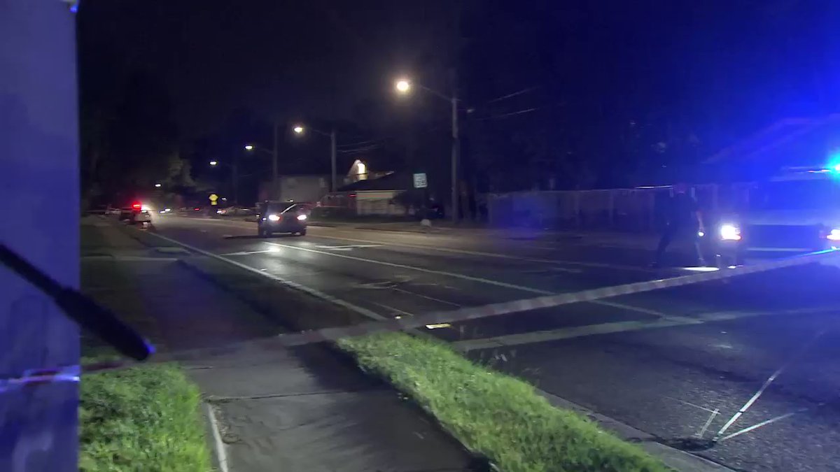 Officer involved shooting, an SUV being chased by police sped right thru the crime scene.   A JSO Lieutenant told the SUV was stolen, the driver fled from them and crashed thru 2 fences just a few minutes down the road