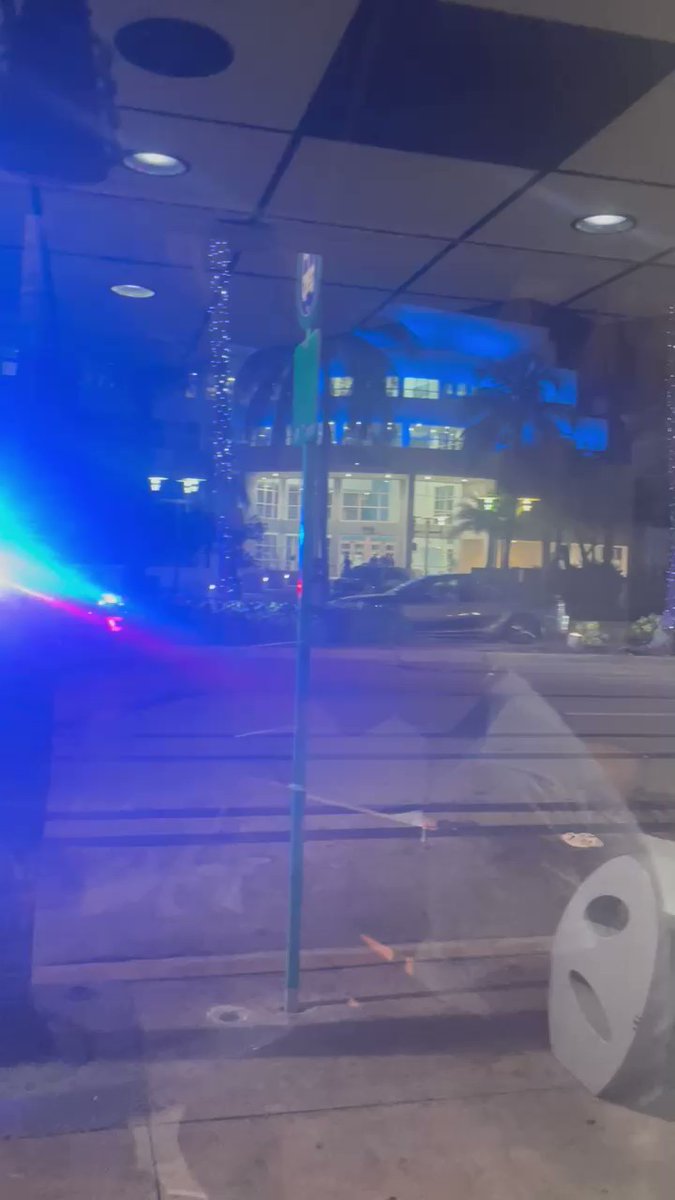 Confirmed: Last night's shooting inside the Clevelander Hotel lobby was a murder. Victim was dead on arrival upon being brought to Jackson. This is video of a suspect being brought into the front doors of @MiamiBeachPD headquarters moments later