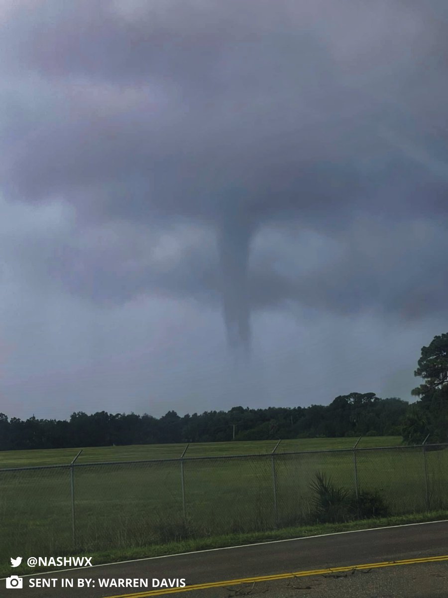 Waterspout (or possible tornado) near Holiday, Florida during this morning's Pasco County tornado warning. Holiday is a suburb of the Tampa-St. Petersburg-Clearwater area.