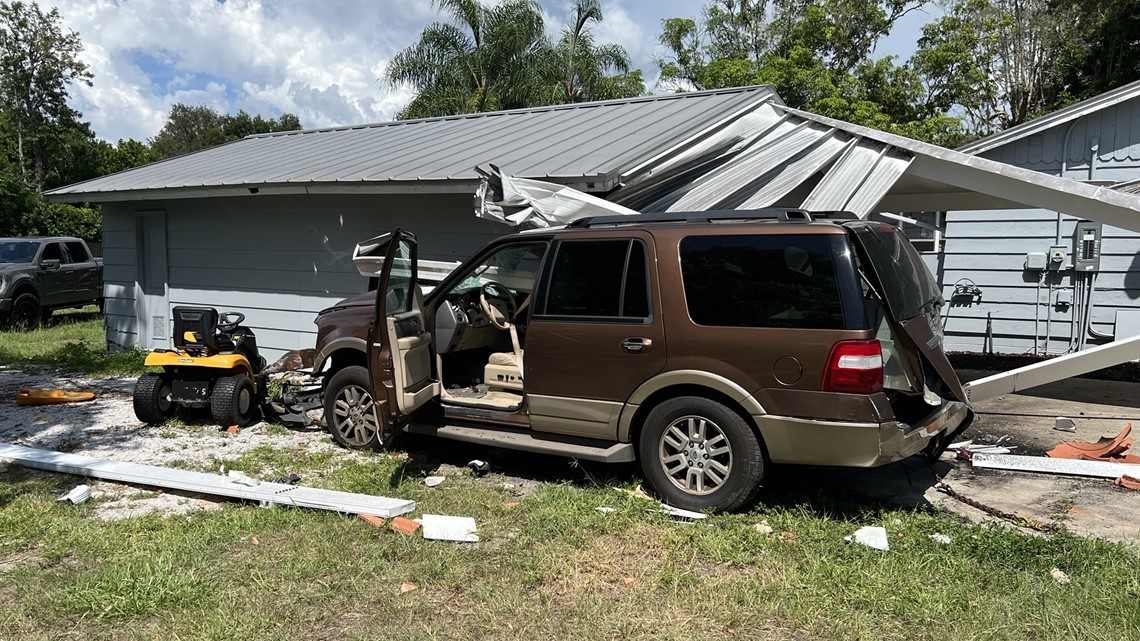 Driver sent to hospital after crashing SUV into Sarasota home