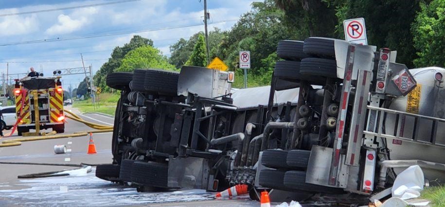 Hillsborough Troopers are investigating a tanker truck that overturned and spilled a large volume of gasoline along US-41 at Madison Ave - Driver uninjured - Road closed for extended period - Motorists should seek alternate routes