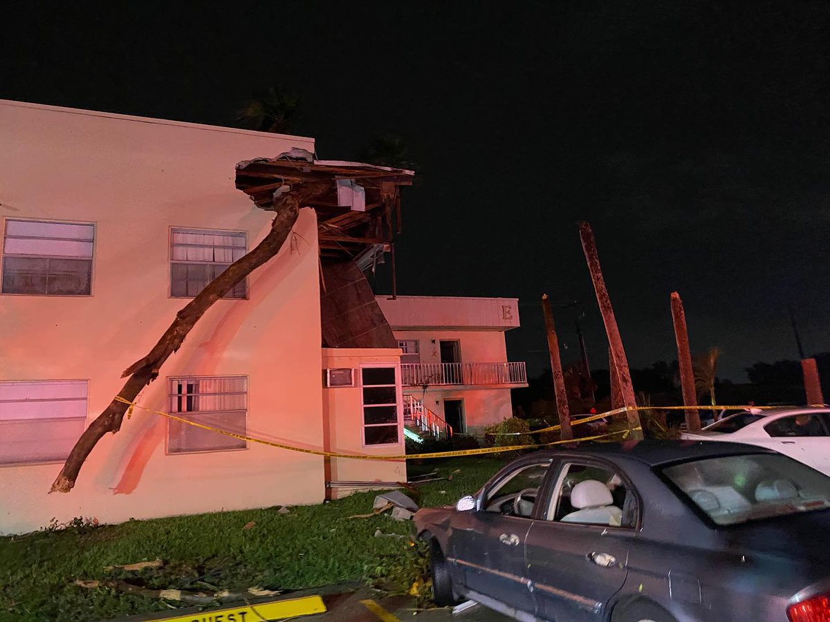 The roof was blown of one of the condo buildings and dozens of cars are piled up/destroyed. per @PBCFR : 35 people were evacuated 2 people hospitalized