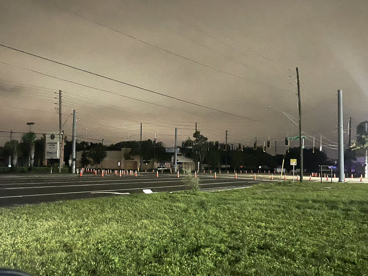 Damage in PinellasCounty. In Seminole this massive shopping plaza sign collapsed over. It looks like the steel is rusted. The wind is whipping. In largo, power is out on East Bay Dr. 