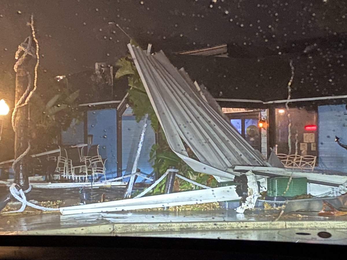 Damage to St. Johns River Steak & Seafood Restaurant in Sanford. This is right next to Lake Monroe. It appears to be an awning from the front entrance that was ripped off and tangled by the wind 