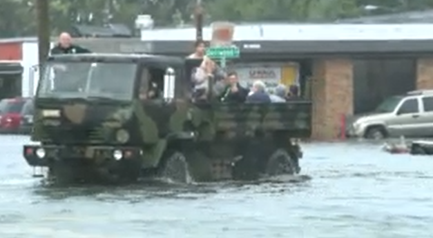 Dozens of people have been rescued from their flooded homes in Ft. Myers, FL 