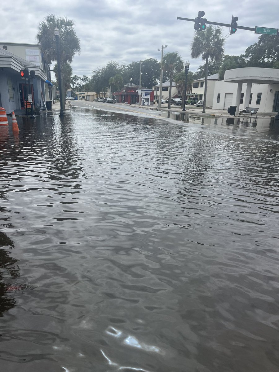 Police are having to shout at drivers to stop them from going past police cars. High tide closed San Marco Boulevard from LaSalle to Cedar shop owners closing but not worried 