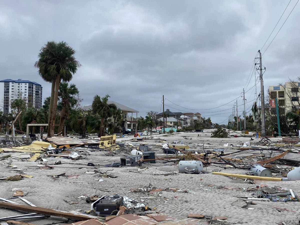 This used to be a street. Now look. A family living on Fort Myers Beach