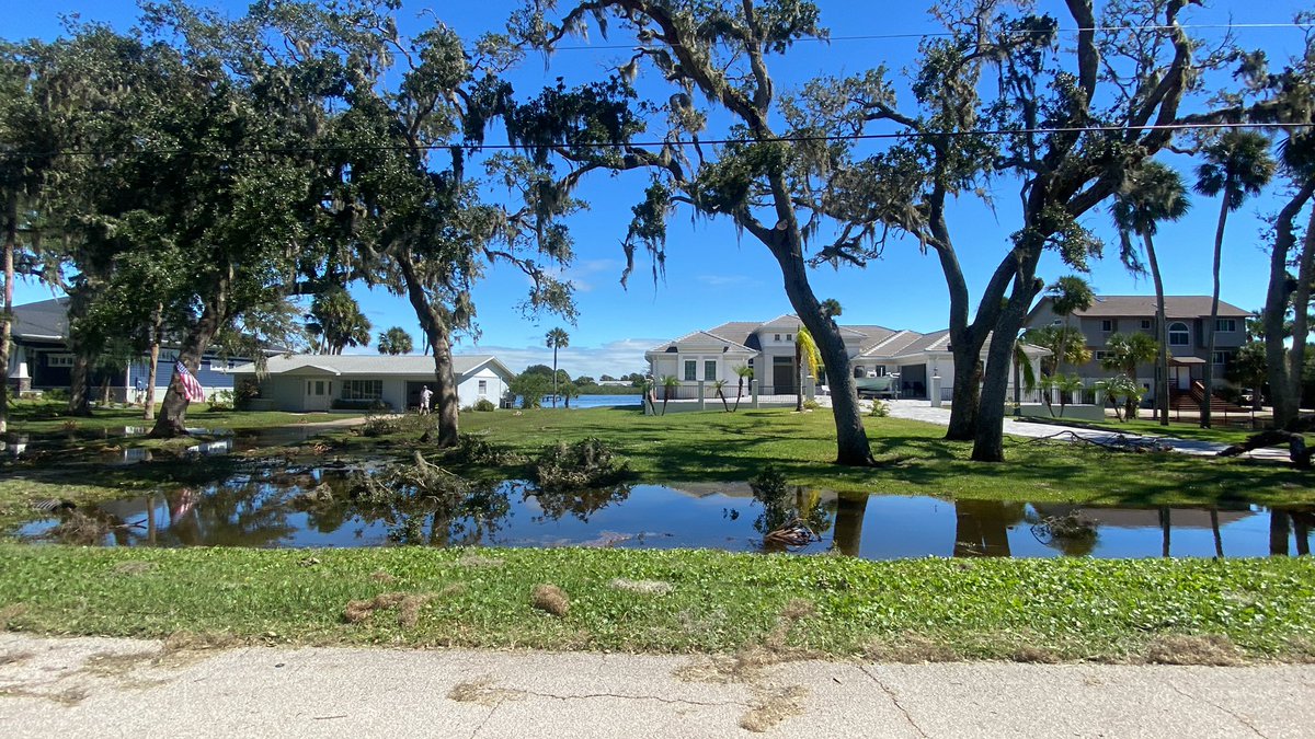 Flagler Beach. This is off Lambert Avenue. A woman's home was flooded and she spent the morning pulling up her floors. The road sits high so the water filled many driveways. Smith creek is right behind this road