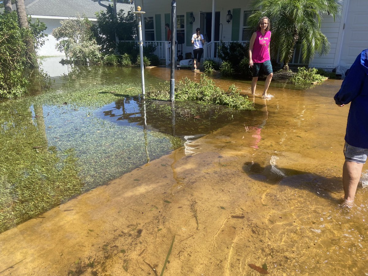 Flagler Beach. This is off Lambert Avenue. A woman's home was flooded and she spent the morning pulling up her floors. The road sits high so the water filled many driveways. Smith creek is right behind this road