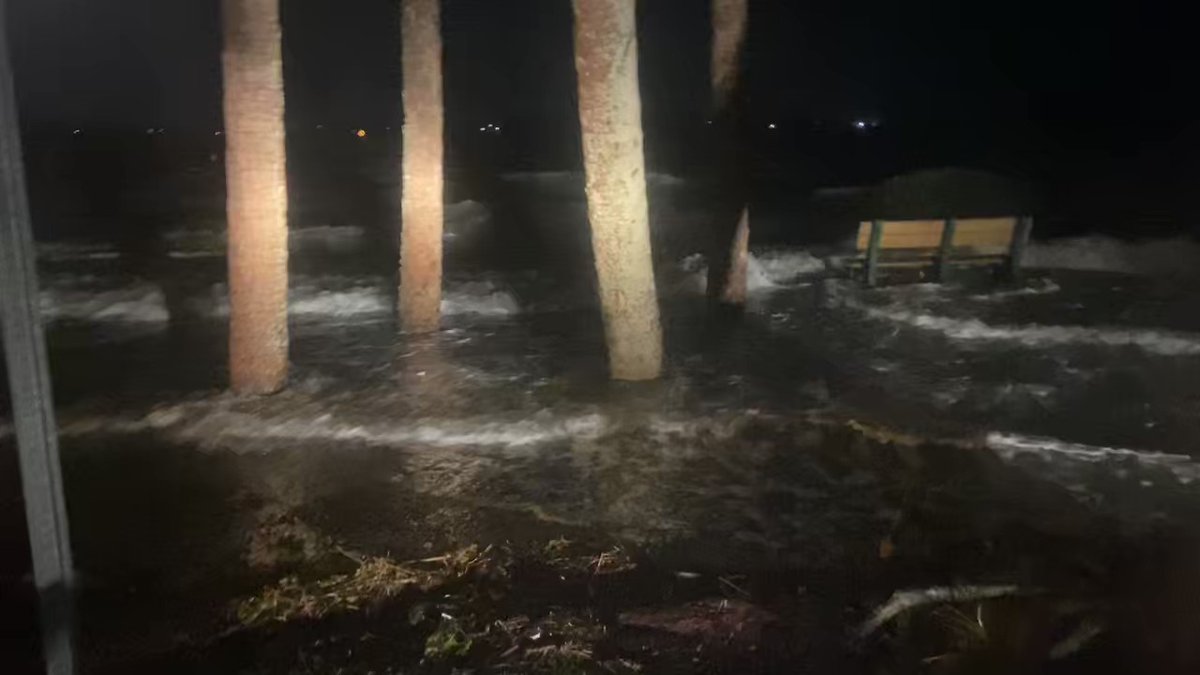 This is Sandsprit Park around 10:30pm.   The wind has really picked up and the storm surge has the water into the parking lot.