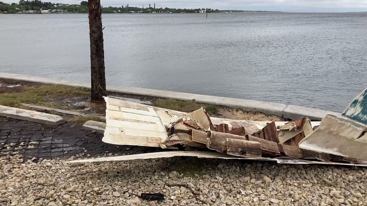 Boat ripped apart overnight along Jensen Beach Causeway in Martin County. A day earlier, it was being bashed against concrete wall. Now destroyed