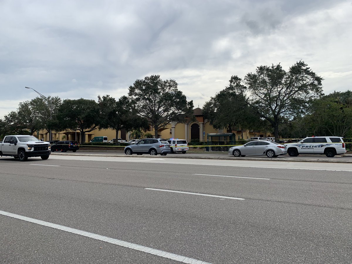 Officers are focusing on the hotel next-door to the doctors office on Fruitville Road. Officer say the suspect is in stable condition and their officer is uninjured  