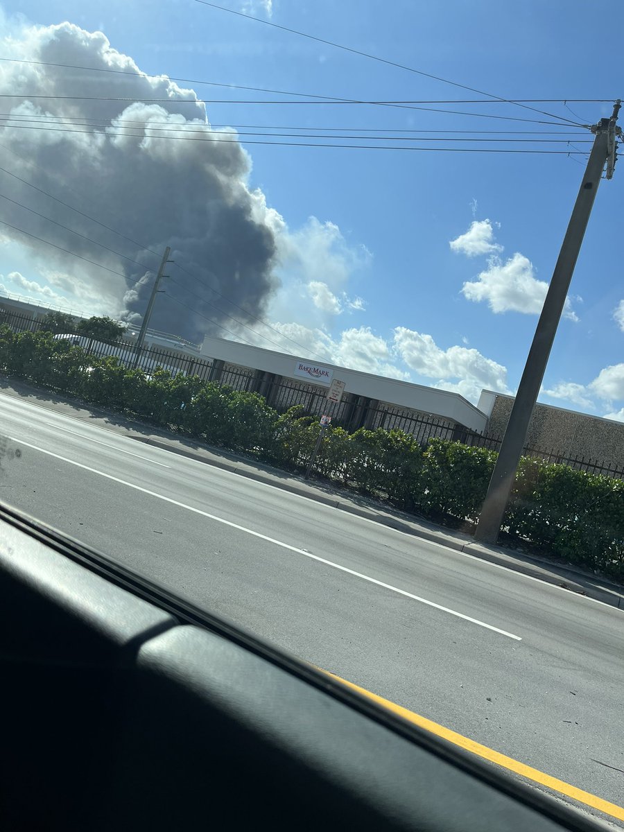 Crews are battling a massive fire that broke out at an auto parts store in Hialeah.