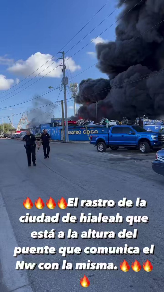 A massive fire breaks out at the Rastro Coco junkyard on the streets of the Hialeah lockdown area.  