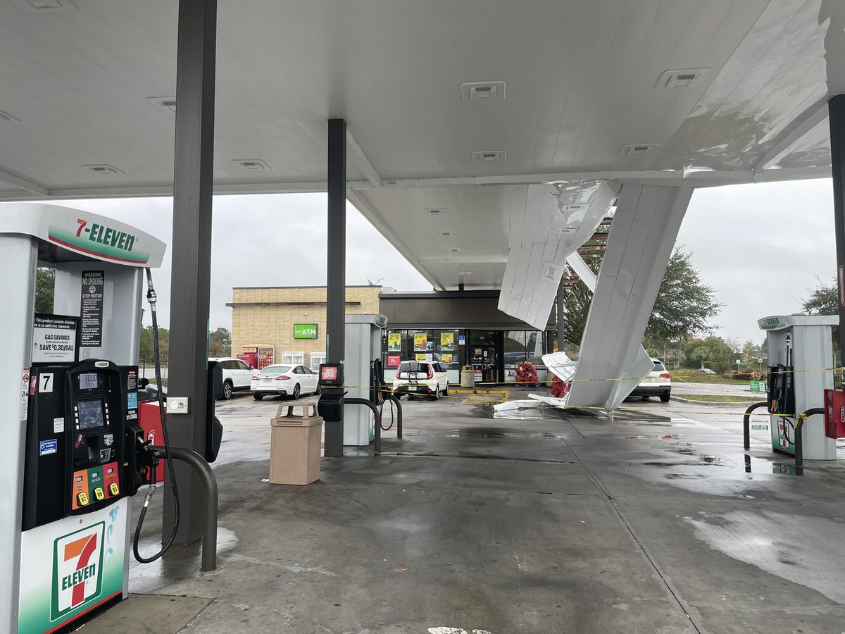 This 7-Eleven was damaged in the storm that hit Spring Hill  You can see part of it came down on the side of that white car