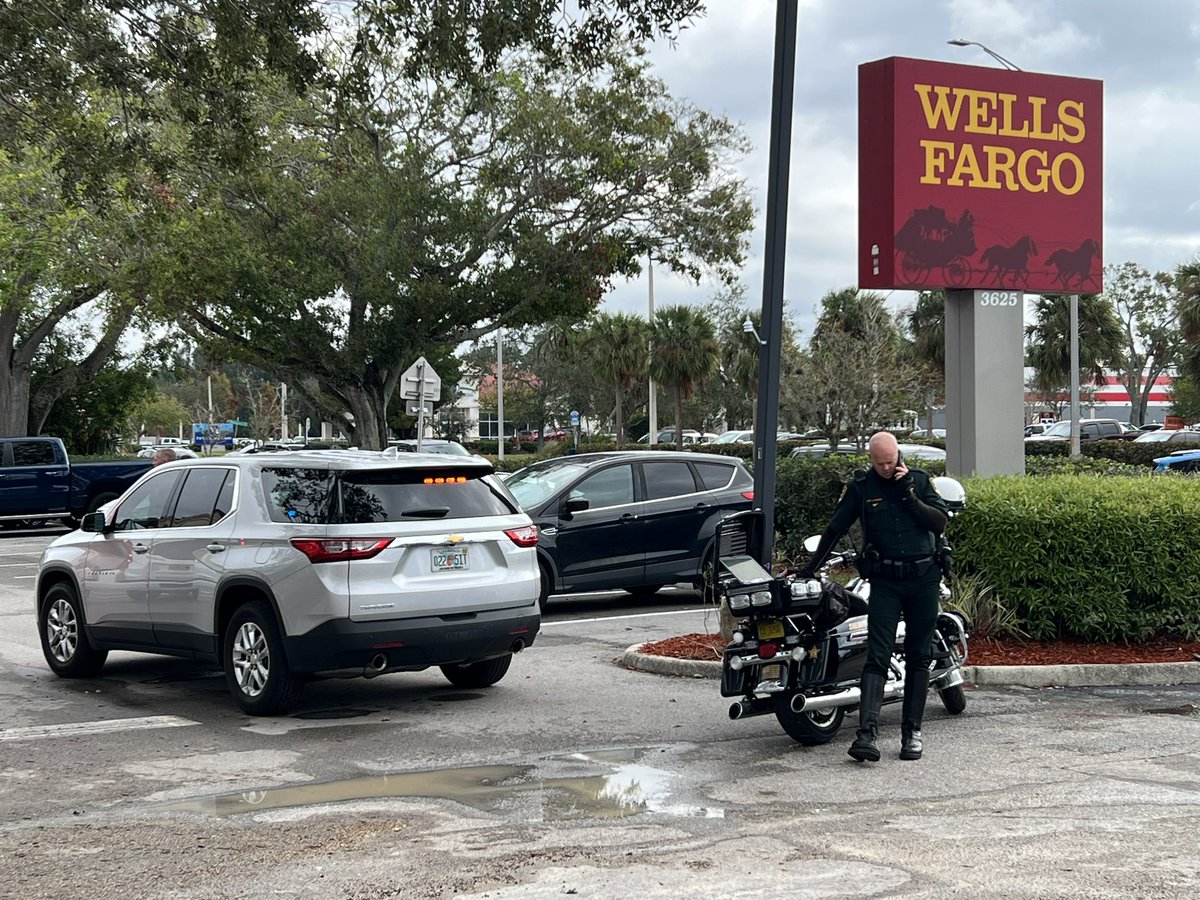 Sarasota County Sheriffs office is searching for an armed suspect who they believe robbed Wells Fargo Bank on Bee Ridge at 10am. The suspect is wearing an orange jacket, black hat, and jeans. FBI is also currently on the scene