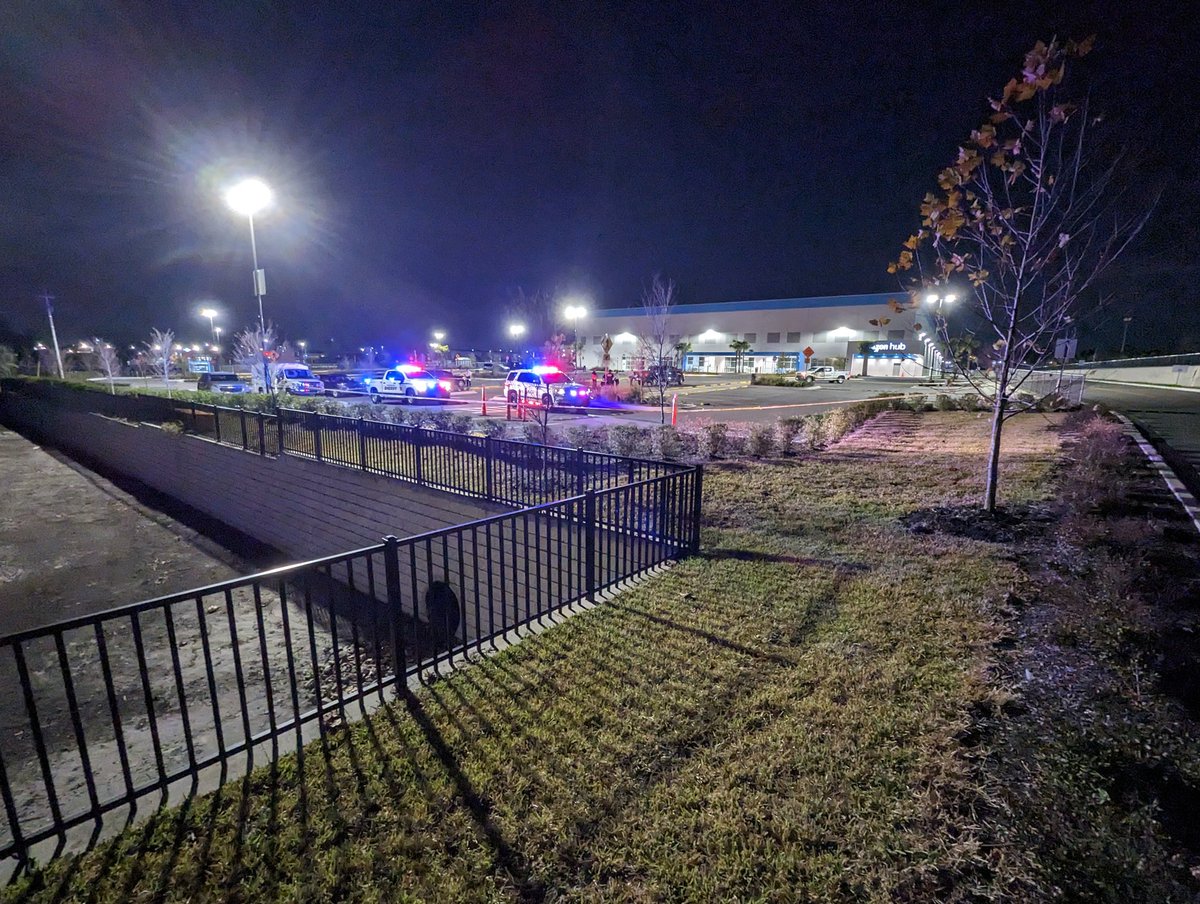 The @HCSOSheriff is working a possible shooting scene at the Amazon Hub off Harney Rd just north of Hillsborough Ave. There are evidence markers in the parking lot