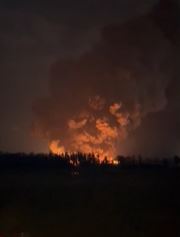 Firefighters are working to protect a nursery from a massive fire burning several acres in Kissimmee, Florida on Thursday morning. Flames and smoke are shooting into the air that can be seen from miles away