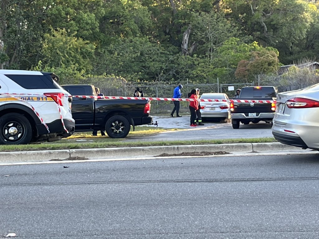 Homicide investigation at 6500 New Kings Rd. Detectives have a good chunk of the street blocked off as well as a home. Several people are standing outside around the home. 