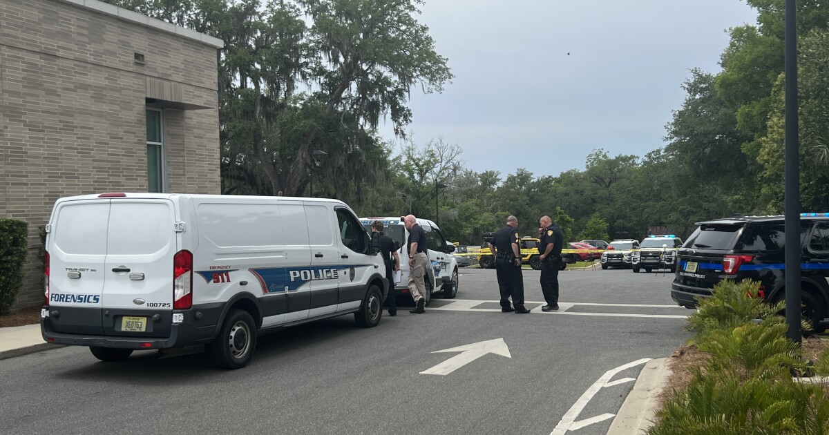 Tallahassee police are searching for the suspect in a shooting outside a downtown credit union