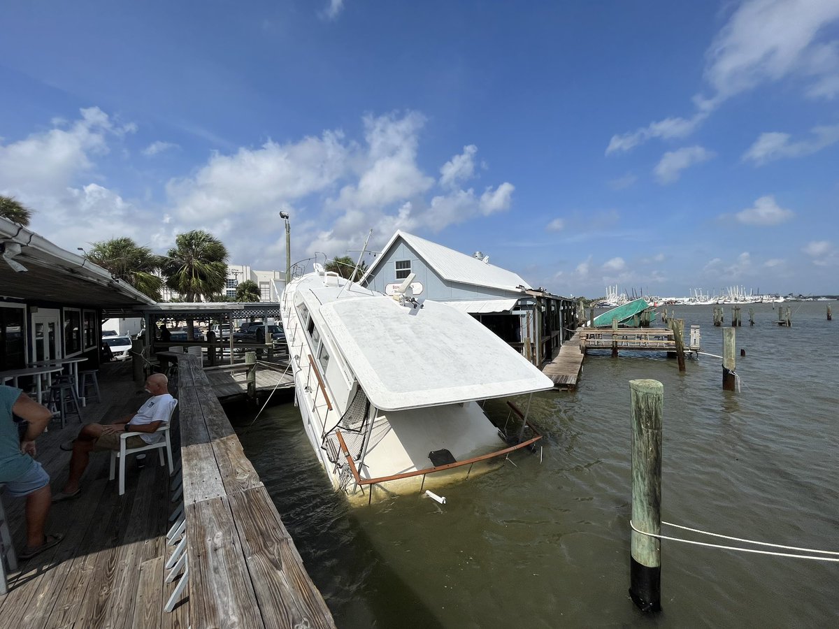 Idalia: Despite 2-4 feet of storm surge from Hurricane Idalia, this boat remains dislodged on the dock of this restaurant. The managers here at Bonita Bill's say it will take a crane to get this boat out of here 