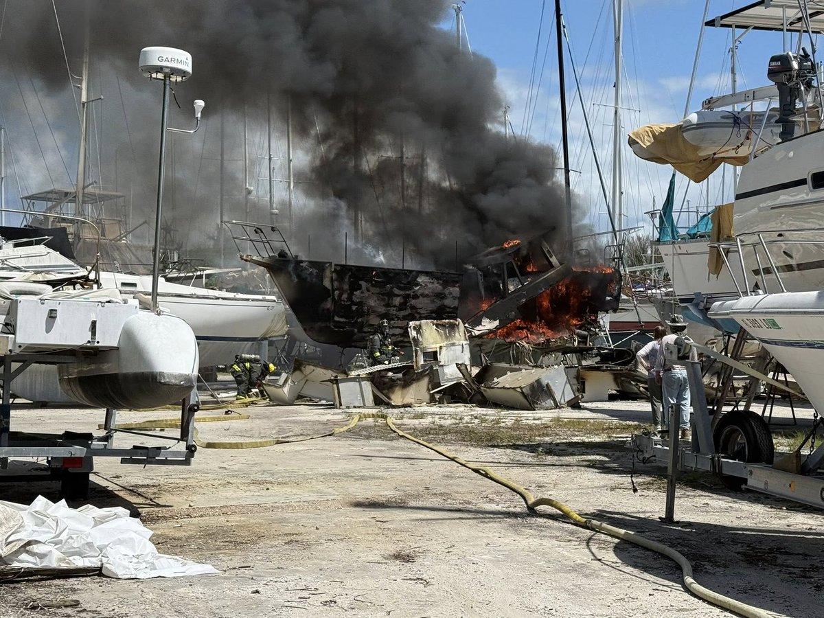 Firefighters battled a sailboat fire at Riverside Marina in Fort Pierce on Saturday, quickly containing the blaze with no reported injuries