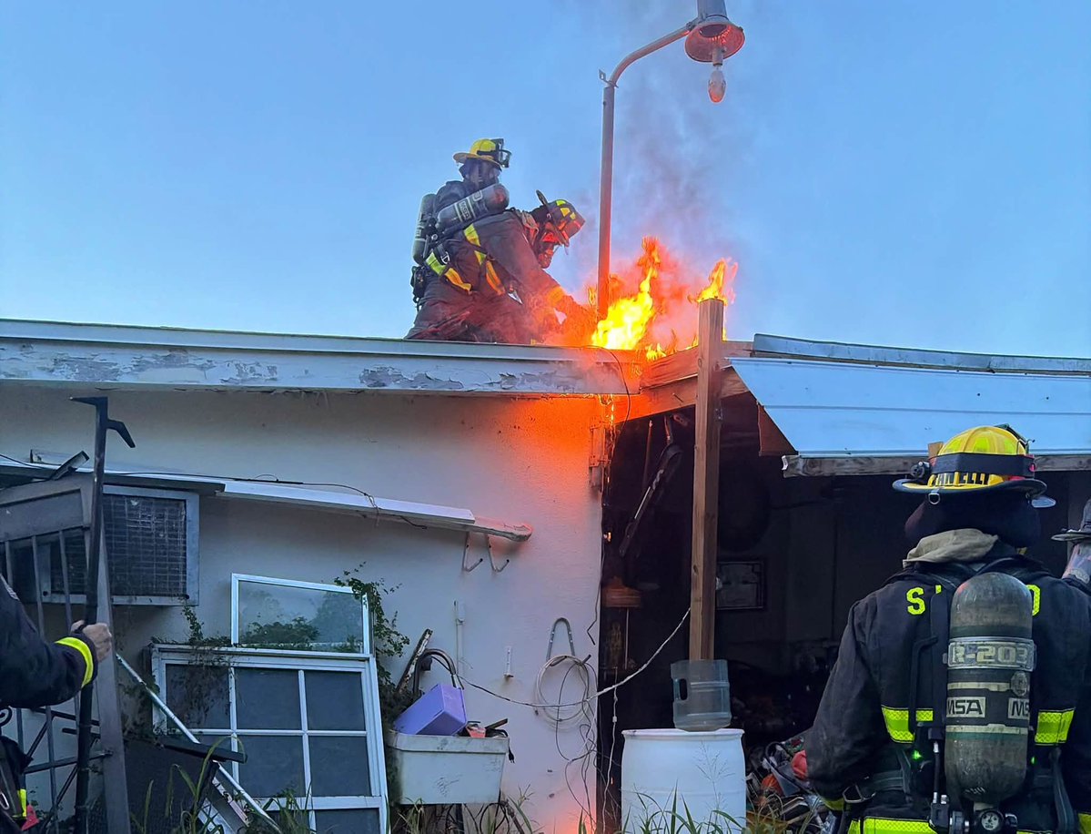 Firefighters rescued two dogs after responding to a house fire in Port St. Lucie on Friday night