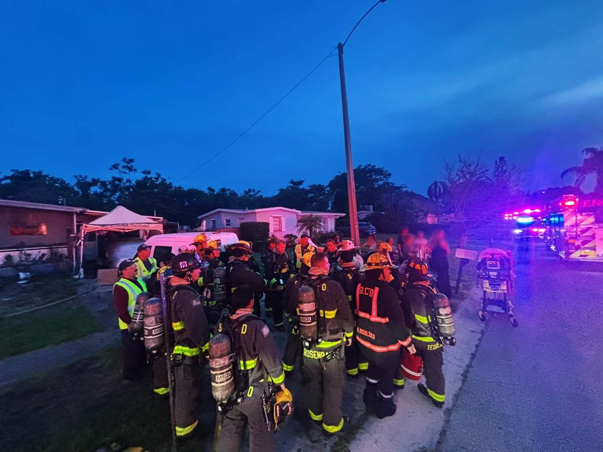 Firefighters rescued two dogs after responding to a house fire in Port St. Lucie on Friday night