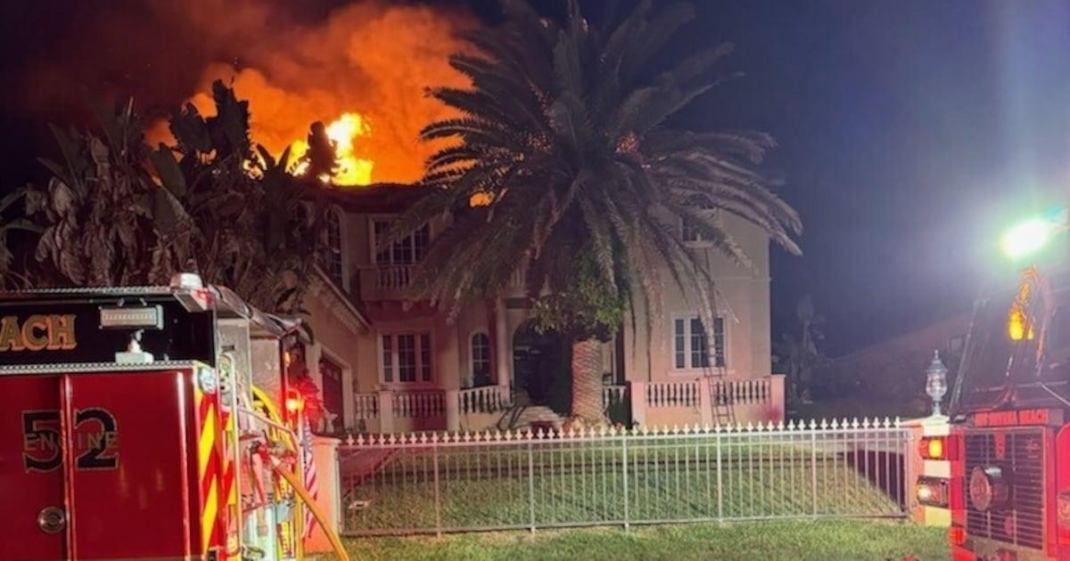 Firefighters battle large fire at New Smyrna Beach home