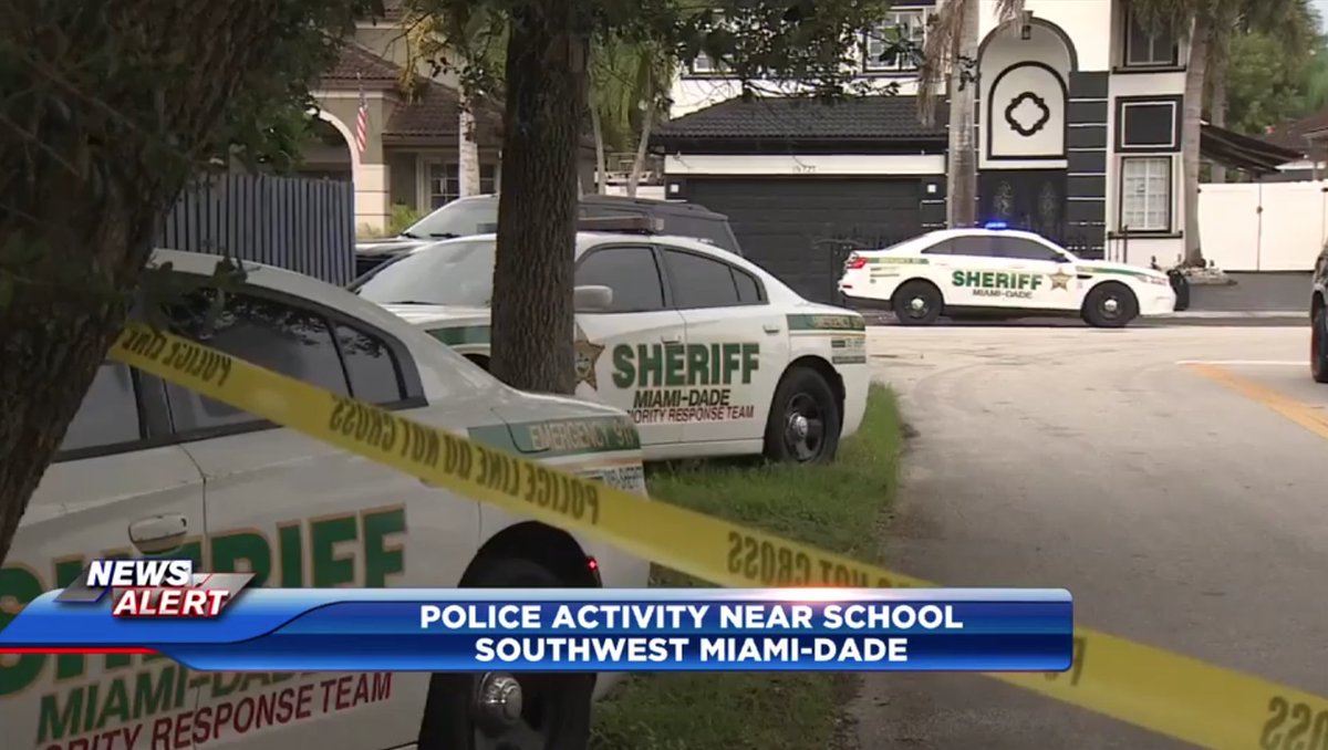 A heavy law enforcement presence in Southwest Miami-Dade prompted a lockdown at a nearby middle school and reportedly sent one person to the hospital
