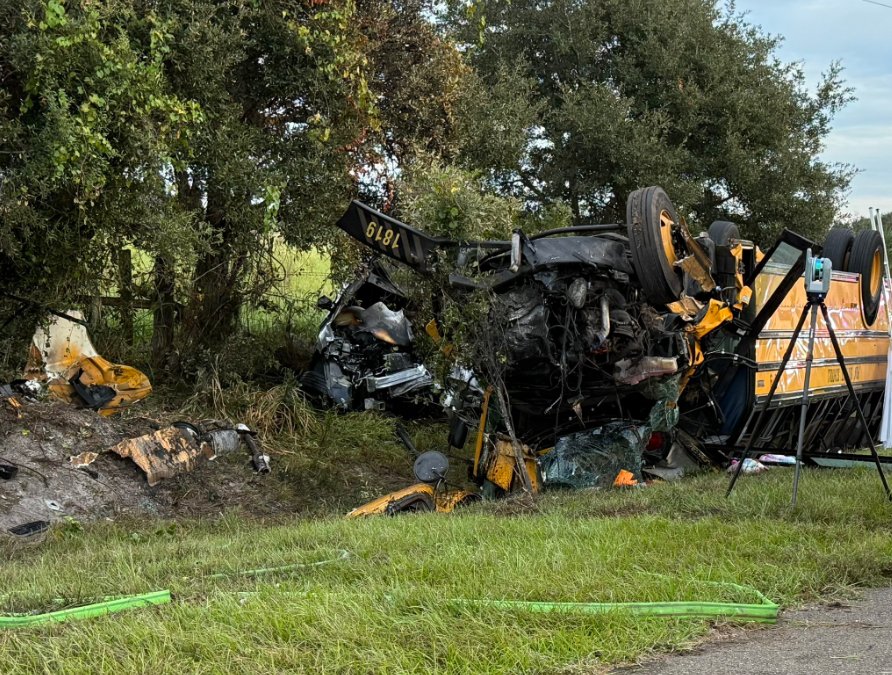 Two people, including a 10th-grade girl, were killed and several others injured Monday when a school bus overturned onto its roof in a multi-vehicle crash in Florida